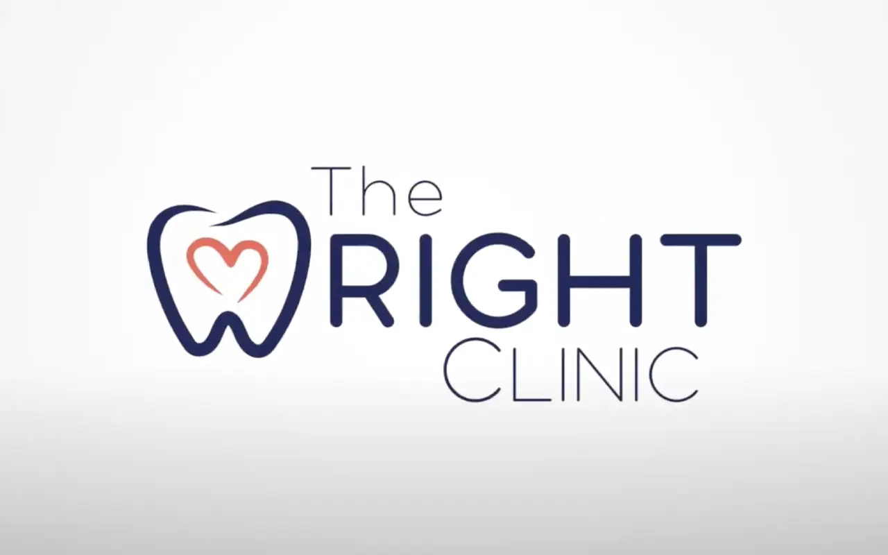 The Wright Clinic logo: a stylized tooth with a heart, alongside the clinic's name.